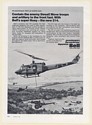 1975 Bell 214 Super Huey Military Helicopter Carries Howitzer Print Ad