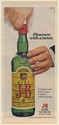 1972 J&B Rare Scotch Pleasure with a Twist Every Time You Open a Bottle Print Ad