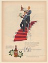 1947 PM Deluxe Whiskey Servers Roll Out The Red Carpet Print Ad