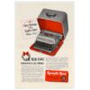 1948 Remington Rand DeLuxe Portable Typewriter Ad
